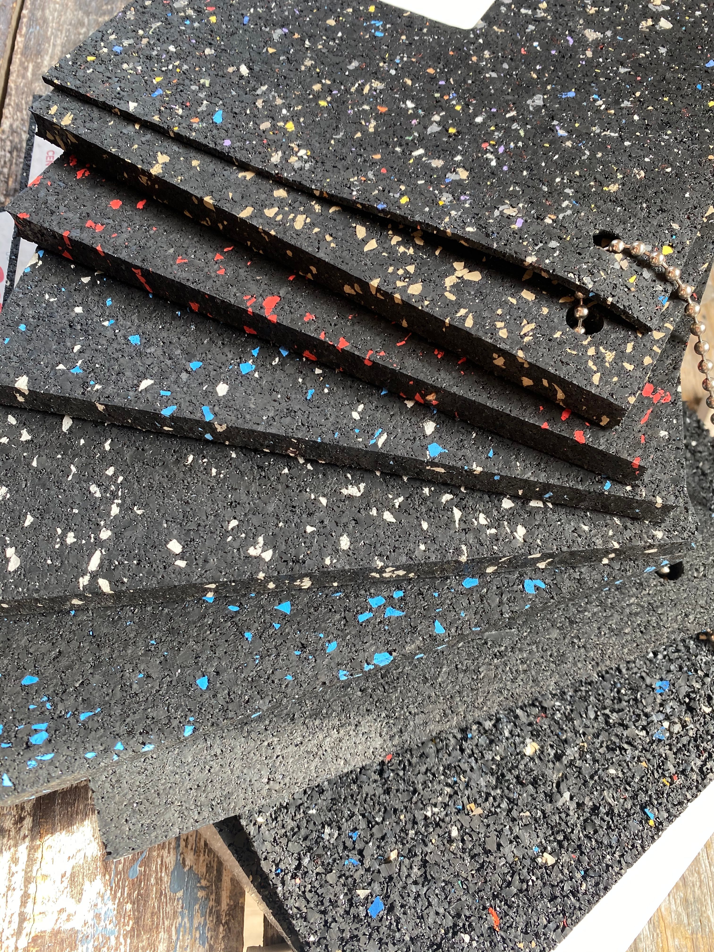 Colorful rubber gym flooring with speckled pattern samples for home fitness facilities