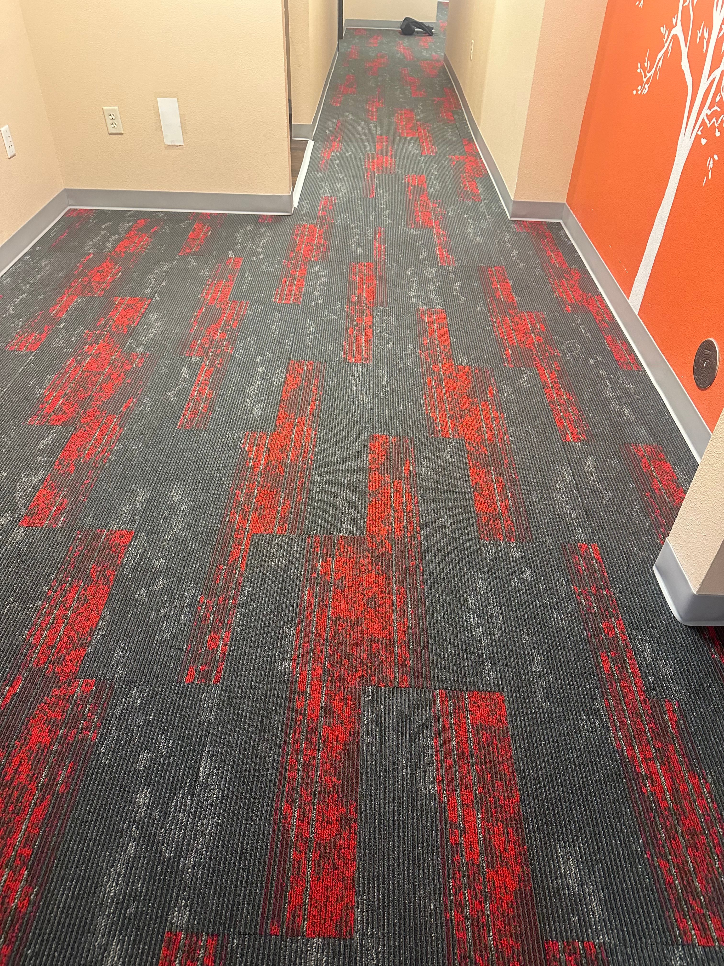 Commercial grey and red patterned carpet tile installation in Decatur TX office building