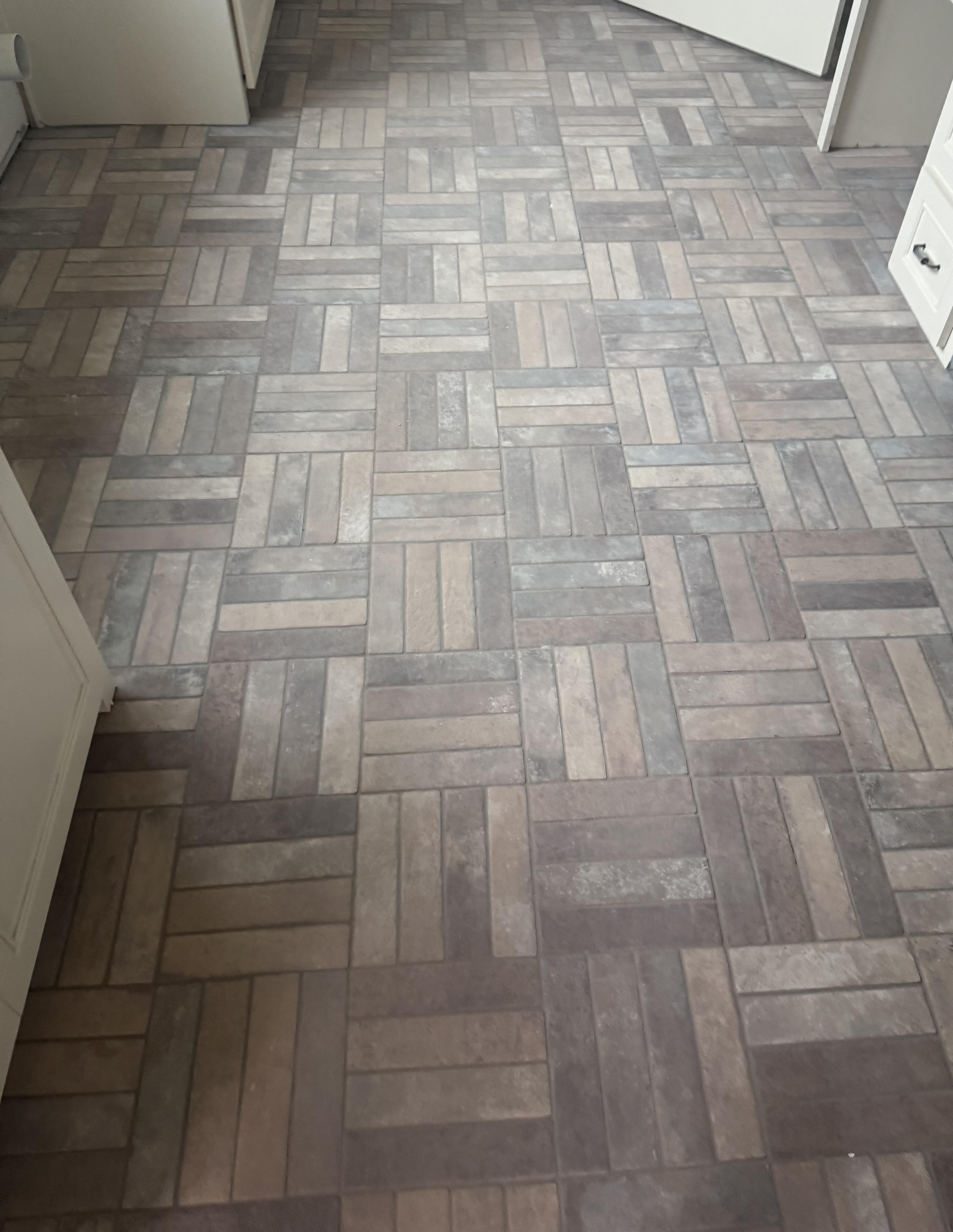 Natural travertine tile floor in Versailles pattern with white wainscoting in Wise County sunroom